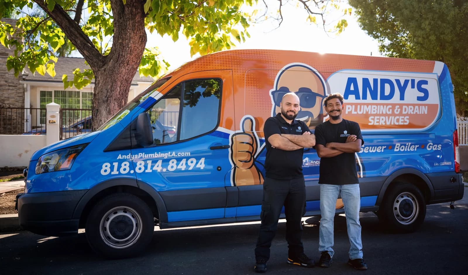 Andy's Plumbing team in front of a branded service van in Los Angeles